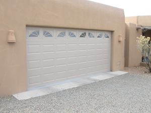 Broken Garage Door to be repaired by Doc Garcia.