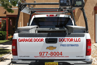 Broken Garage Door to be repaired by Doc Garcia.